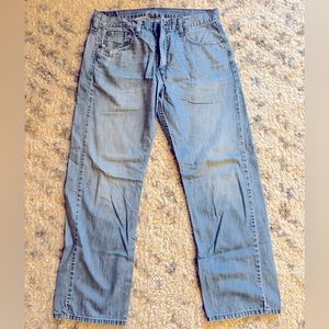 Levis 569, lightly distressed Jeans